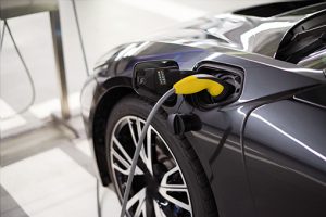 An electric car is charged