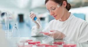 a woman in the lab tests samples