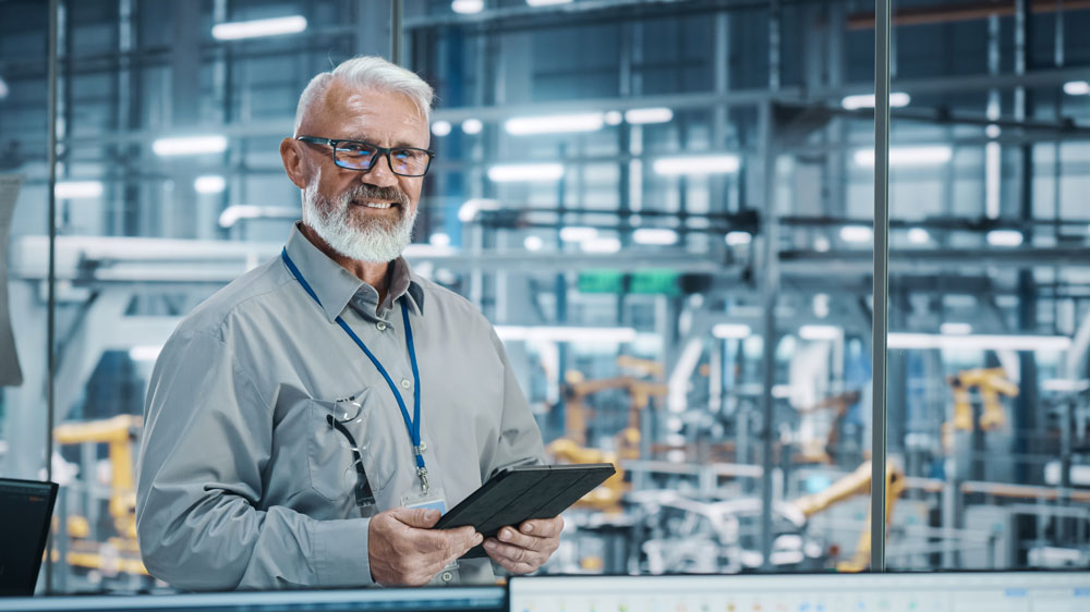 Man holds tablet in his hands